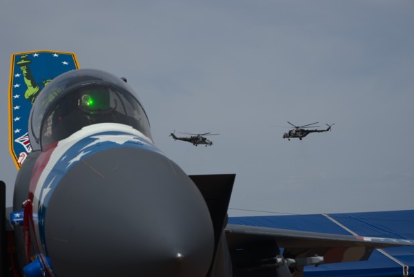 Mi-24V and Mi-171 of the Czech Air Force perform behind an F-15 of the USAF.<br><small>RAF Fairford, Gloucestershire, UK</small><br><small>July 17, 2022</small>